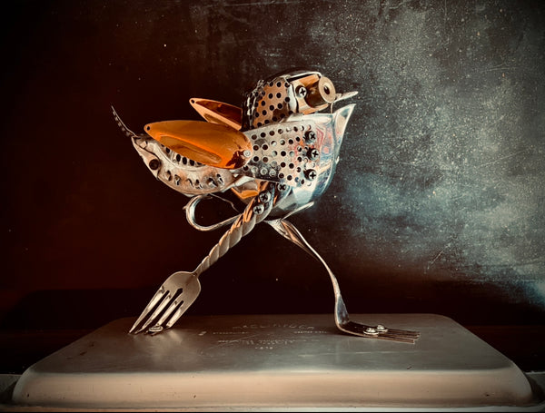 Running Bird, stainless, aluminum, copper and brass sculpture by artist Ritch Branstrom, available at Cerulean Arts.