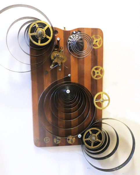 Unwinding Time, found object assemblage sculpture by Cerulean Arts Collective member Kathleen McSherry