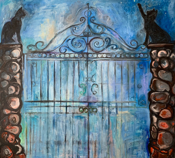 Decorative gate with intricate metalwork and stone pillars against a blue background