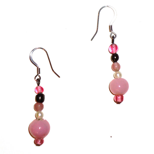 Glass bead earrings in shades of pink with silver wires available at Cerulean Arts.  