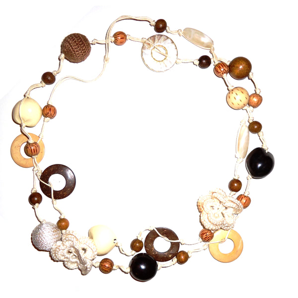 Multi bead necklace in shades of browns and cream; Includes glass, wood and fabric covered beads, available at Cerulean Arts.