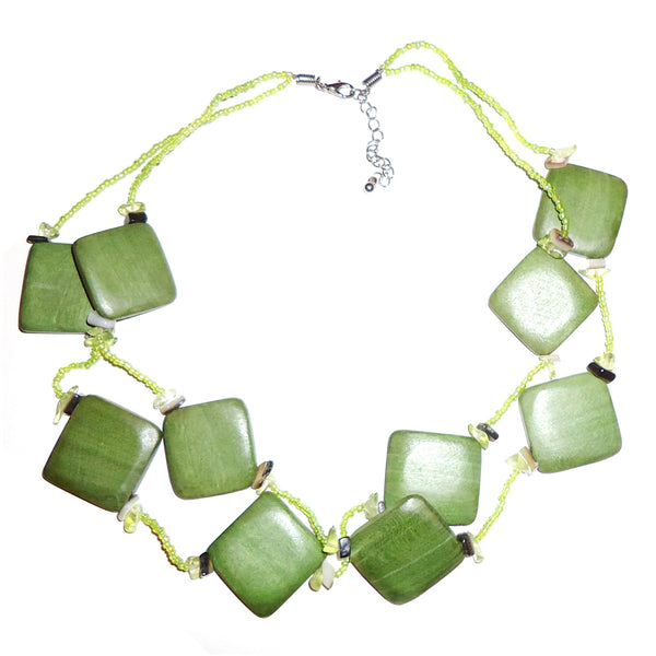 Green double strand necklace with glass seed beads and large square wood beads, available at Cerulean Arts.