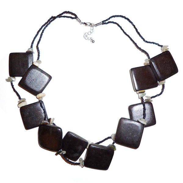 Black double strand necklace with glass seed beads and large square wood beads, available at Cerulean Arts.