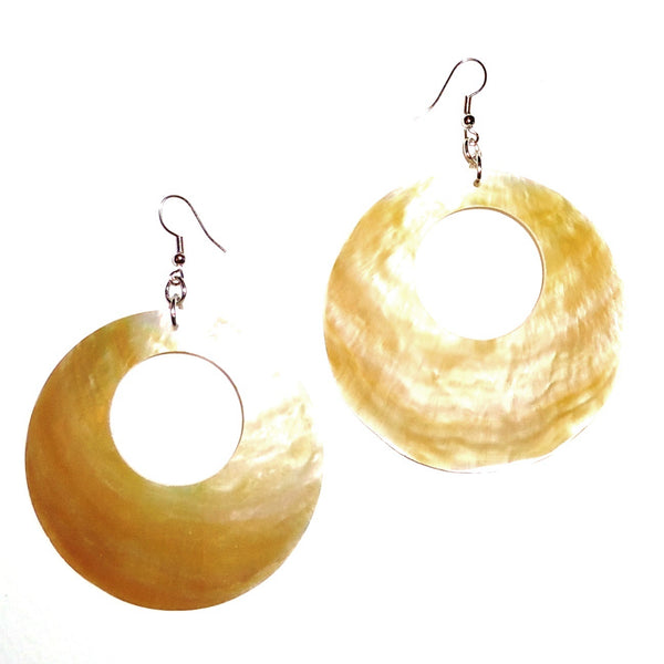 Large white abalone shell earrings with circle cut-out, available at Cerulean Arts.