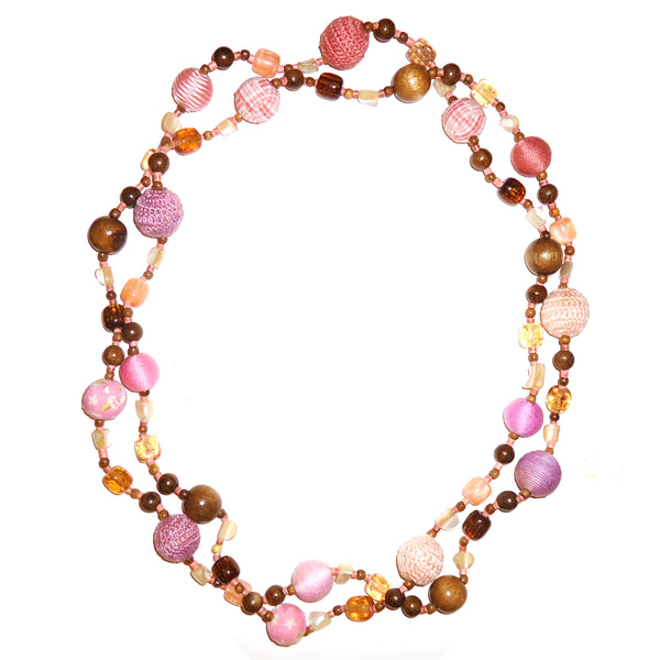 Multi bead necklace in shades of mauve, brown and pink available at Cerulean Arts.