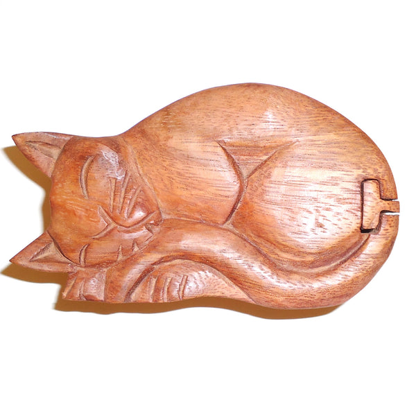 Carved wood sleeping cat puzzle box.