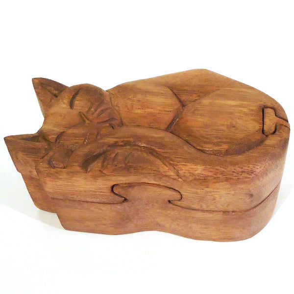Carved wood sleeping cat puzzle box.