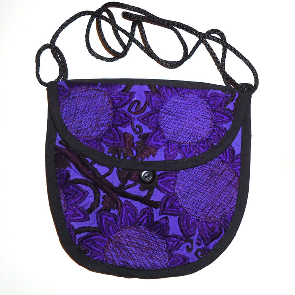 Purple cotton crossbody bag with embroidered floral front, available at Cerulean Arts.