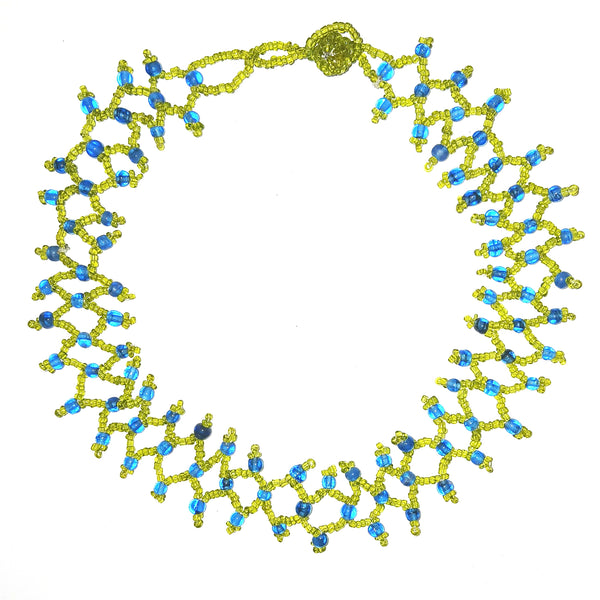 Intricately beaded choker necklace in bright green with blue highlights, available at Cerulean Arts.