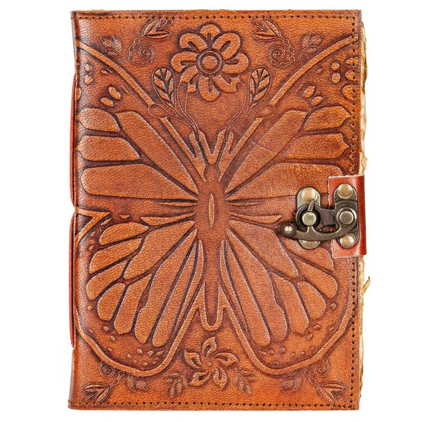 Brown leather journal with butterfly and floral embossing.