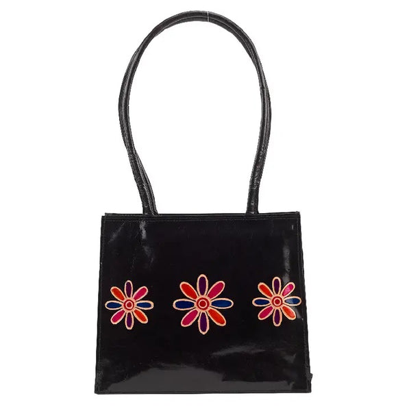 Black leather handbag with colorful floral design