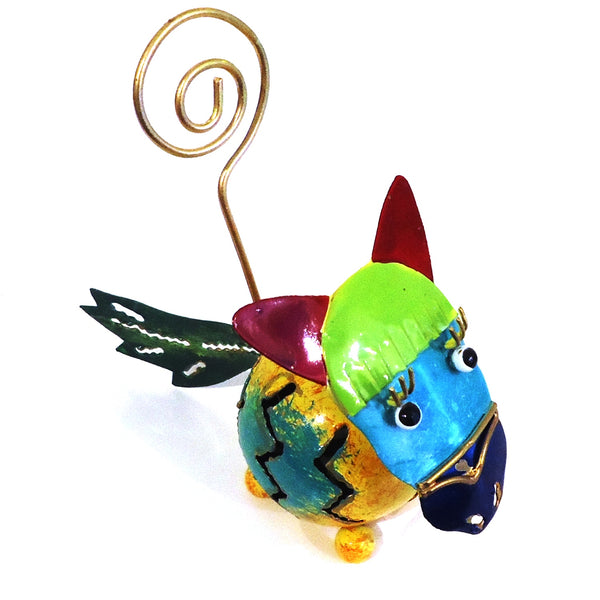 Colorful horse-shaped sculpture with a gold wire photo holder