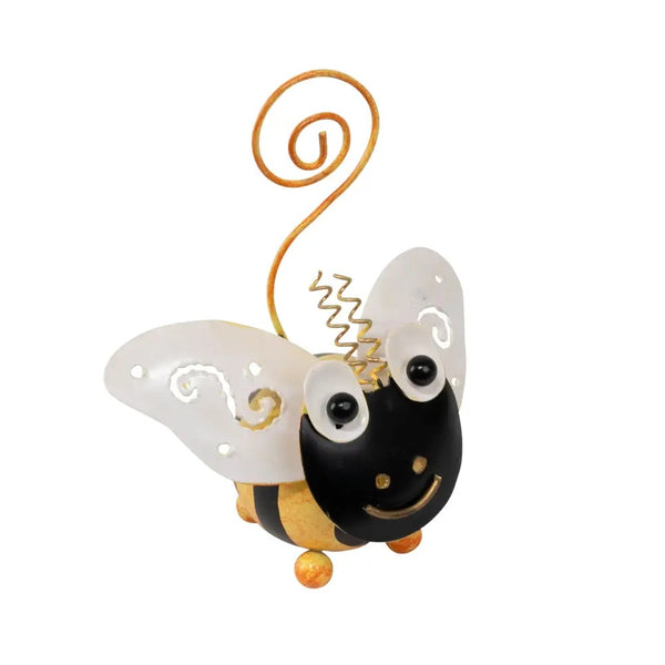 Decorative bee ornament with white wings and black body 