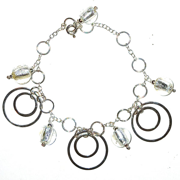 Silver bracelet with circular silver charms and glass beads 