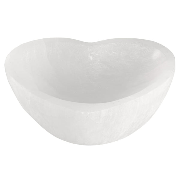 Carved white stone bowl in the shape of a heart.