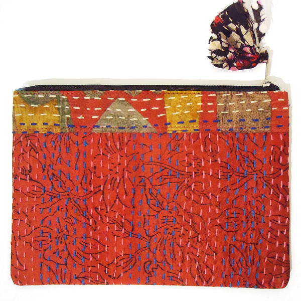 Upcycled sari silk pouch with kantha stitching available at Cerulean Arts.