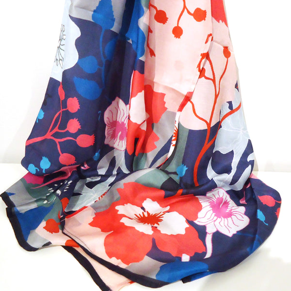 Floral print scarf in navy and bright fuchsia colors, available at Cerulean Arts.