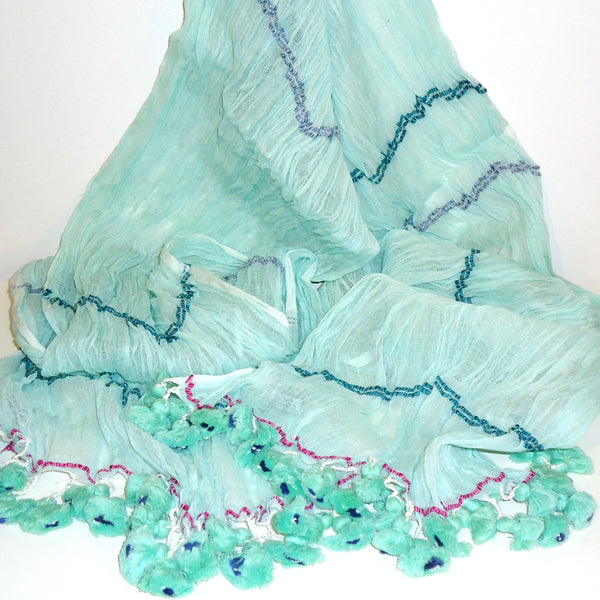 Finely-woven mint green cotton scarf with subtle stripe and playful tassels, available at Cerulean Arts.