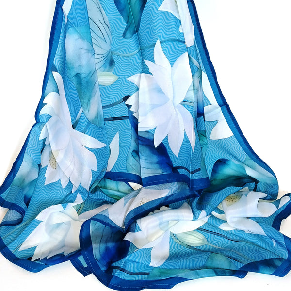 Bold lotus design scarf in rich shades of turquoise, available at Cerulean Arts.