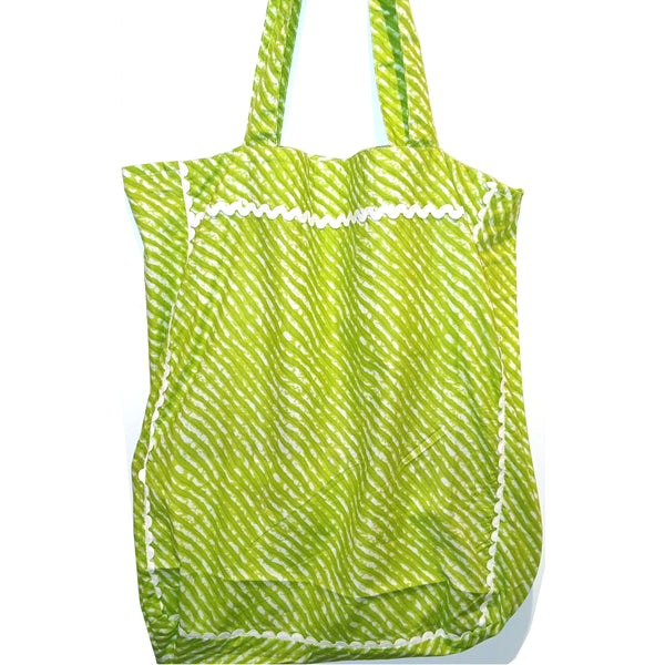 Green patterned tote bag with white trim 