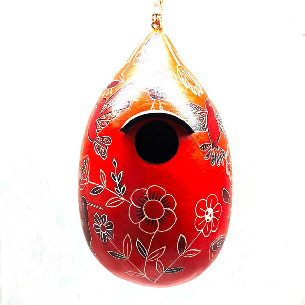 Decorative gourd birdhouse with hand carved floral and hummingbird patterns
