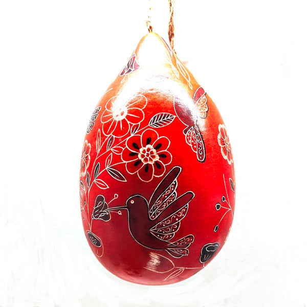 Decorative gourd birdhouse with hand carved floral and hummingbird patterns