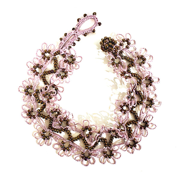 Decorative purple silk crochet bracelet with bronze seed beads
