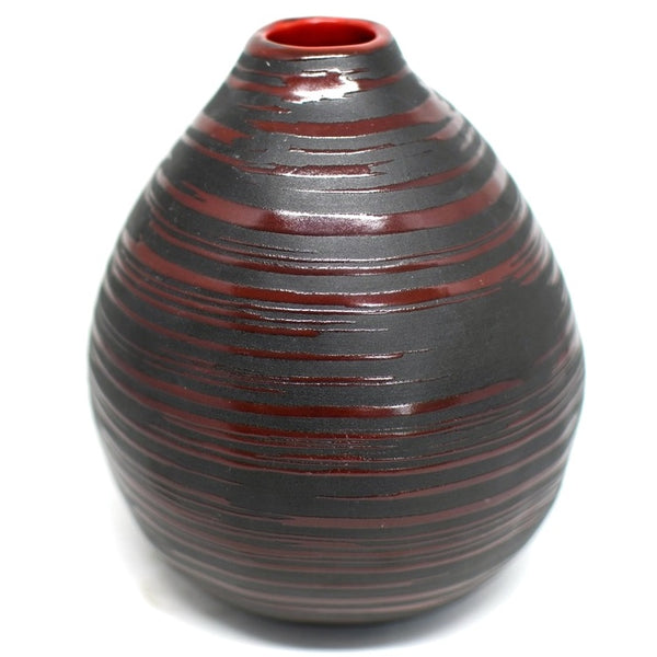 Red glazed porcelain vase with matte black pattern available at Cerulean Arts.