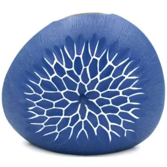 Round porcelain bud vase with textured starburst design in navy available at Cerulean Arts.