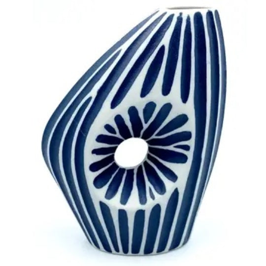 Asymmetrical porcelain bud vase with cutout in navy blue and white stripes available at Cerulean Arts.