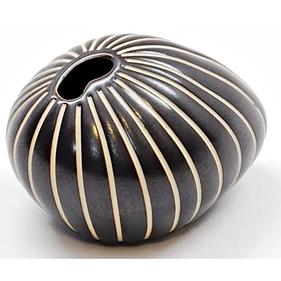 Black and white striped ceramic vase 