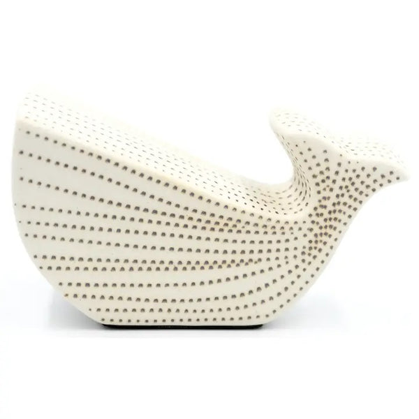White porcelain whale-shaped figurine