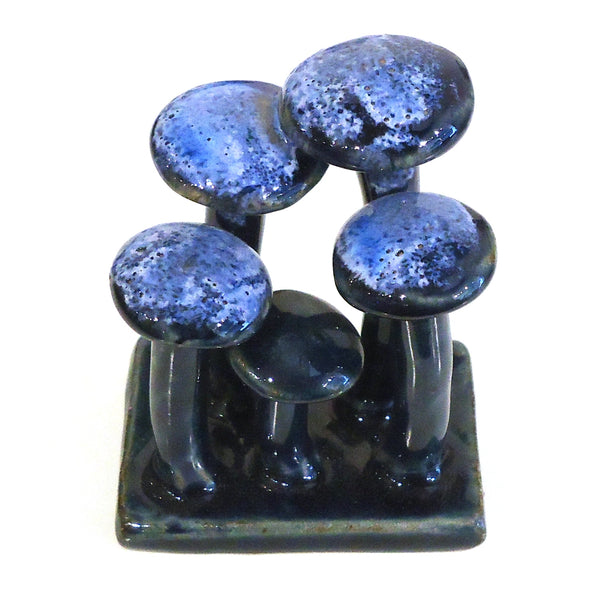 Blue ceramic mushroom figurine