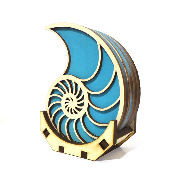 Laser-cut wood nautilus coaster set of four with stand by veteran Robert E. Jones of Baltic by Design, available at Cerulean Arts.