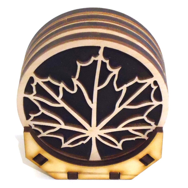 Laser-cut maple leaf coaster set of four with stand by veteran Robert E. Jones of Baltic by Design.
