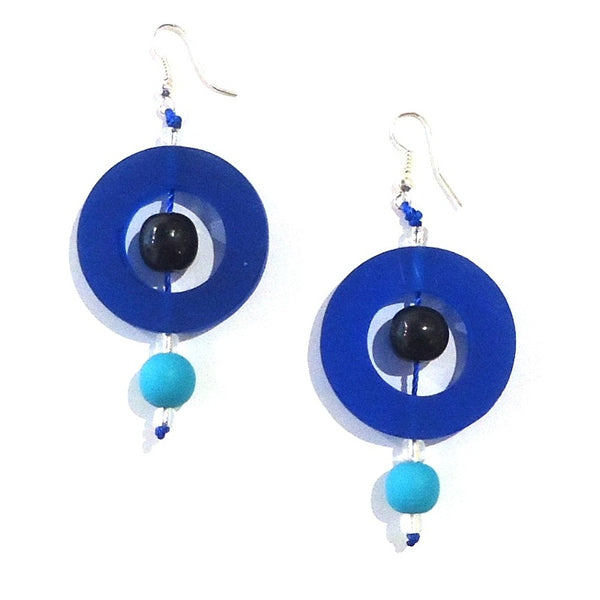 Bold deep blue circular resin earrings with contrasting turquoise and black beads available at Cerulean Arts. 