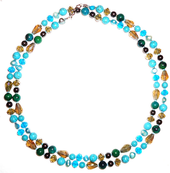 Mixed stone, pearl and crystal bead necklace in shades of aqua and gray available at Cerulean Arts. 