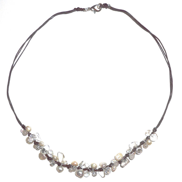 Crystal, mixed stone and pearl necklace in shades of white on wax linen cording available at Cerulean Arts.  