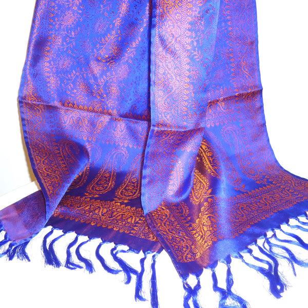 Silk brocade scarf with paisley pattern in orange and blue available at Cerulean Arts. 
