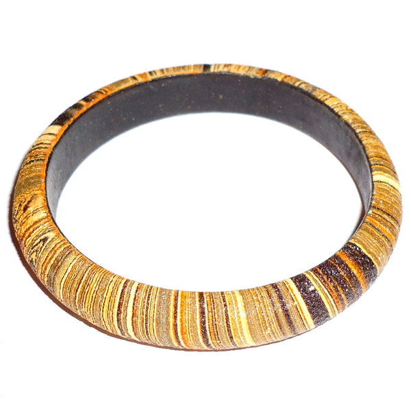 Small marblized wooden bangle in gold colors available at Cerulean Arts. 