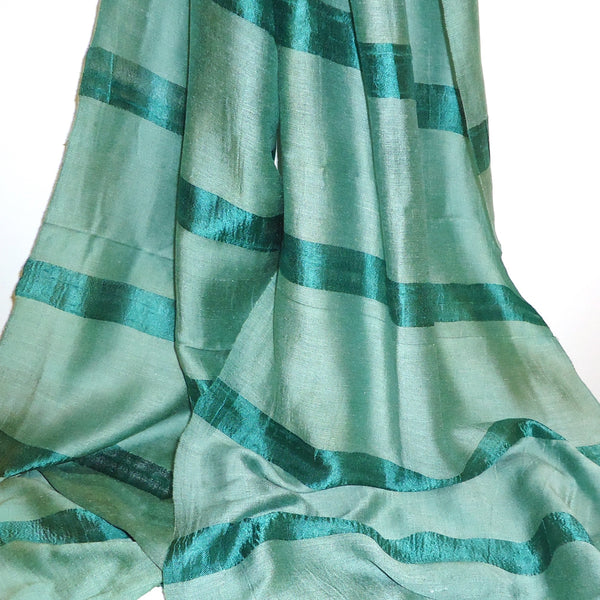 Silk and cotton scarf with stripe in beryl green available at Cerulean Arts.  Handwoven in Thailand.  