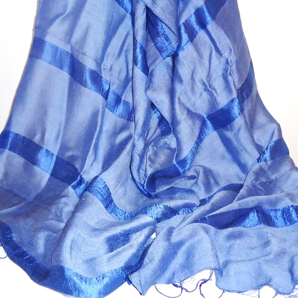 Silk and cotton scarf with stripe in blue available at Cerulean Arts.  Handwoven in Thailand.