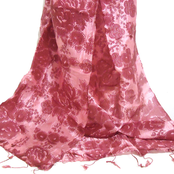 Silk scarf in iridescent plum printed with a darker floral motif, available at Cerulean Arts. 