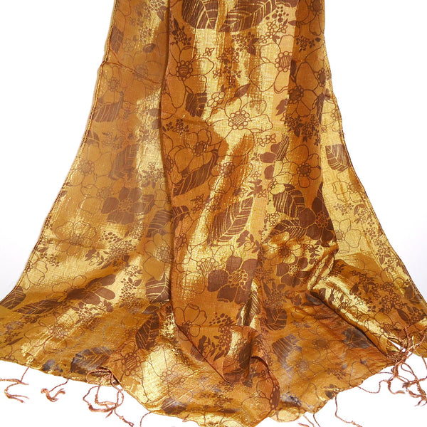 Silk scarf in iridescent bronze printed with a darker floral motif, available at Cerulean Arts. 