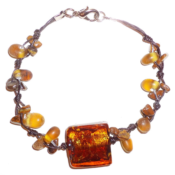 Amber colored art glass with natural stone bracelet, available at Cerulean Arts. 