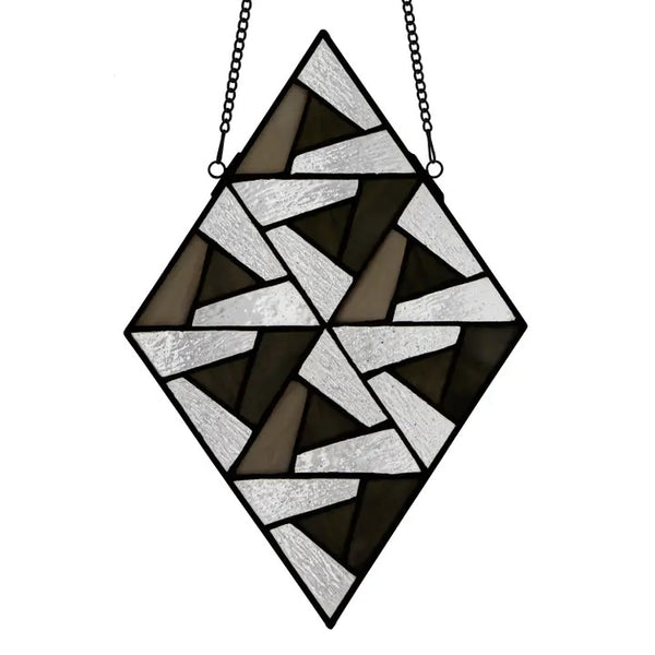 Multicolored stained glass geometric diamond-shaped panel in neutrals, available at Cerulean Arts.