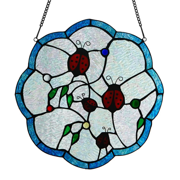 Stained glass panel with ladybugs and flowers on a white background