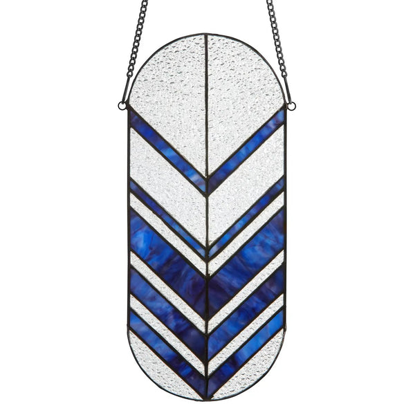 Stained glass panel with blue and white chevron pattern.