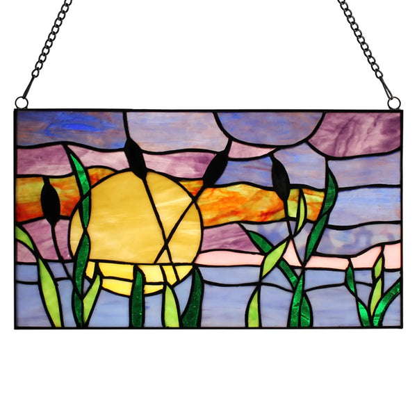 Stained glass panel with a sunset, purple sky and cattails.