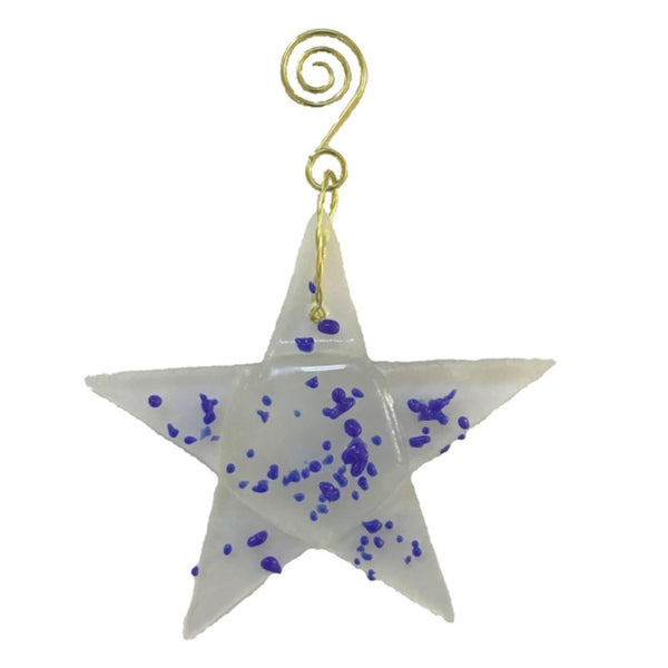 Fused glass suncatcher of a clear star-shaped sugar cookie with blue sprinkles made from recycled wine bottles, available at Cerulean Arts. 